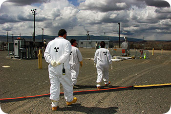 Image of workers in protective clothing on the Savannah River Site