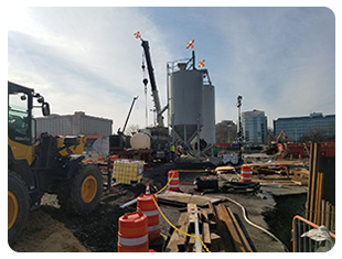 LaGuardia airport concrete silo and construction work area by Throop Company in 2017